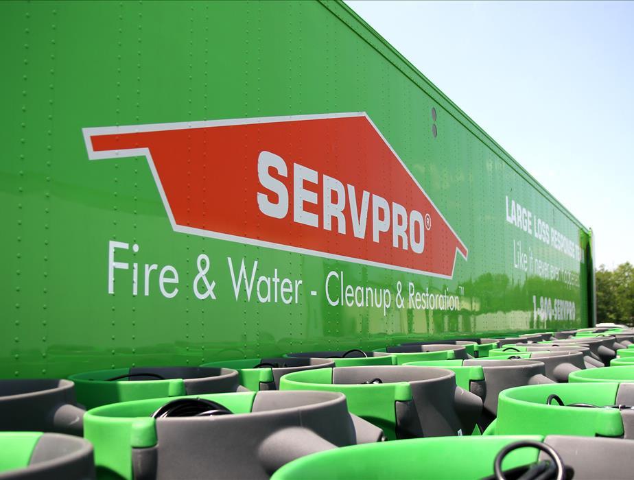 Servpro logo and water extractor machines